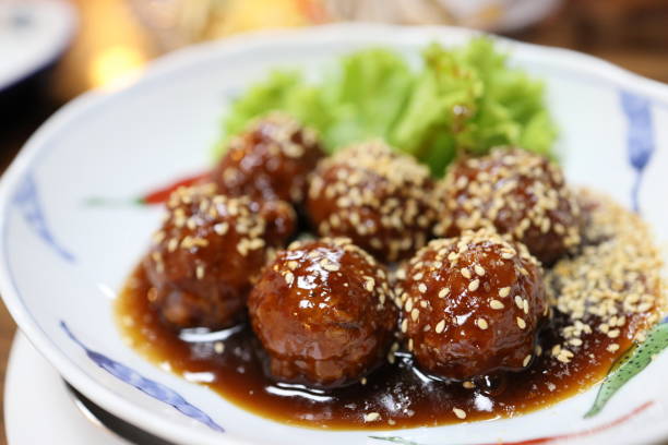 The Japanese meatballs served un thr dish.