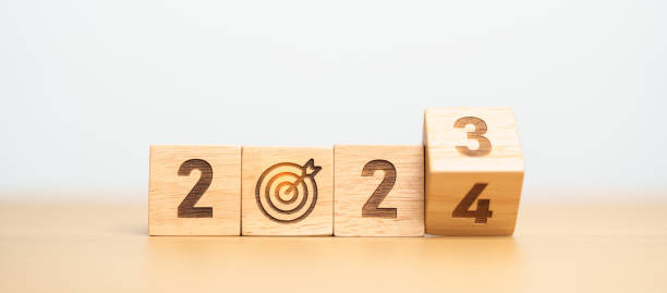 istock 2023 year change to 2024 year block with dartboard icon. Goal, Target, Resolution, strategy, plan, Action, mission, motivation, and New Year start concepts 1705249802
