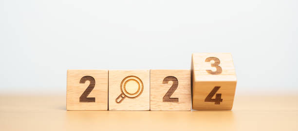 istock 2024 block with magnifying glass icon. SEO, Search Engine Optimization, hiring , Advertising, Idea, Strategy, marketing, Keyword, Content and New Year start concepts 1705249807