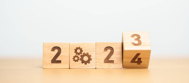 istock 2024 block with gear icon. Business Process, Team, teamwork, Goal, Target, Resolution, strategy, plan, Action, motivation, change, brainstorm and New Year start concepts 1705249825