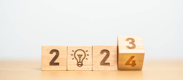 istock 2024 block with lightbulb. Business Idea, Creative, Thinking, brainstorm, Goal, Resolution, strategy, plan, Action, change and New Year start concepts 1705249829