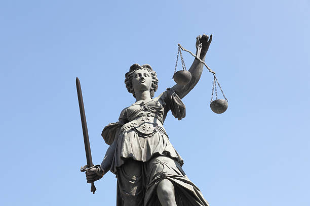 istock perfect blue sky scales with ancient lady Justice Justitia 170525847
