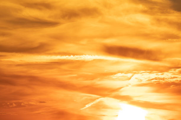 summer evening, sunset in yellow, orange and pink with clouds, background