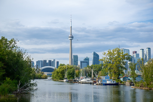 Toronto, Ontario, Canada - 11.10.2022: Rogers Centre and CN Tower in Toronto downtown