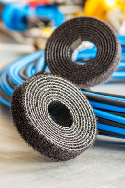 istock Roll of hook and loop velcro tape used to organize cable in electrical installations 1705337927