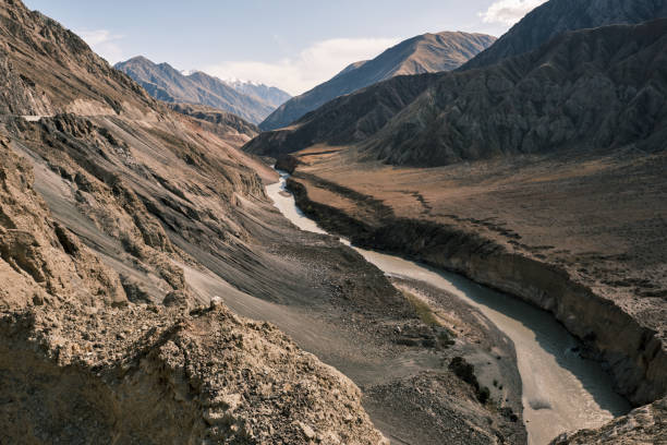 istock River is flowing in mountains. Aerial view 1705344873