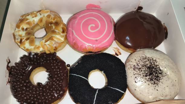 istock Photo fresh donuts on a plate 1705379684