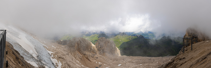A panoramic view of the Dolomites and the countryside into Val di Fassa