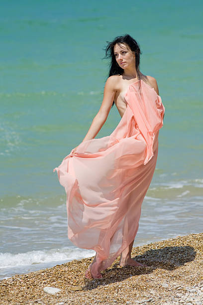 Attractive brunette at the sea