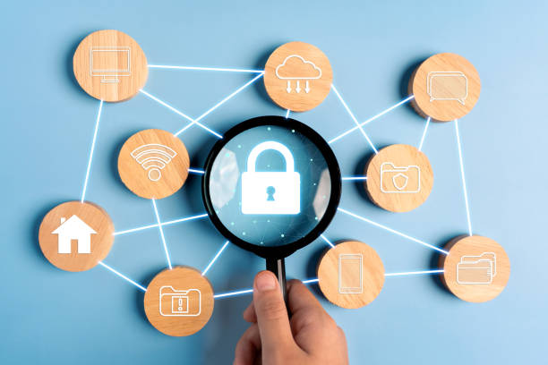 istock Cyber security network concept, man hand holding magnifying glass with lock icon. 1705486910