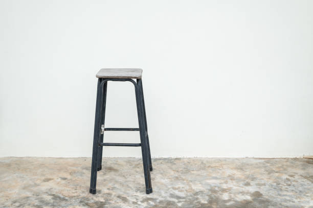Wooden chair and white wall background