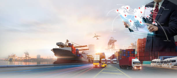istock Businessman holding virtual interface panel of global logistics network distribution and transportation, Smart Global Logistics international delivery concept, World map with logistic network distribution on background 1705489642