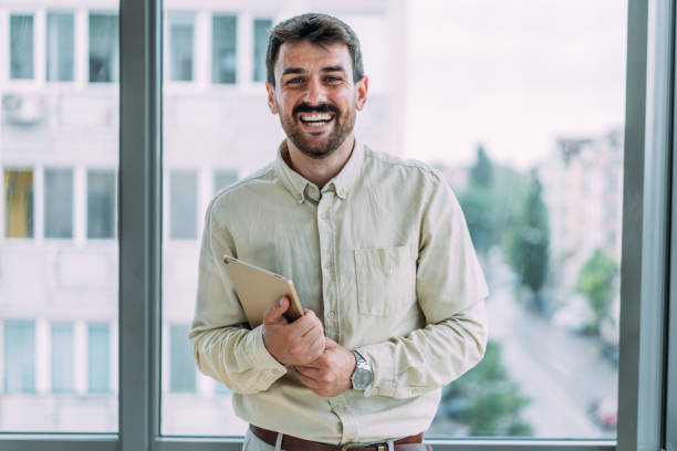 istock Confident businessman in modern office. 1705503964