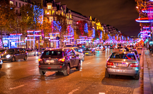 Paris - December 2012: City streets at night in winter.
