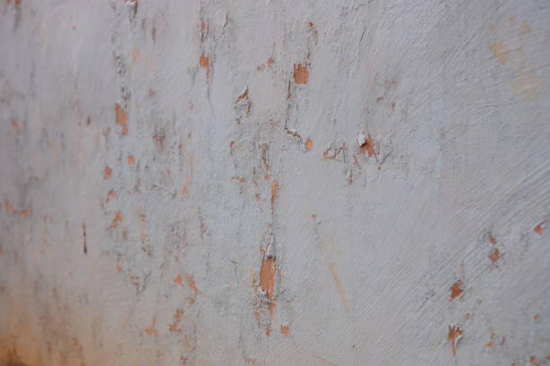 istock Background wall texture is damaged with the wall paint peeling off 1705531520