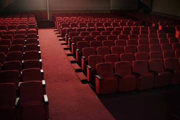 istock Rows of red chairs in an entertainment performance hall 1705534675