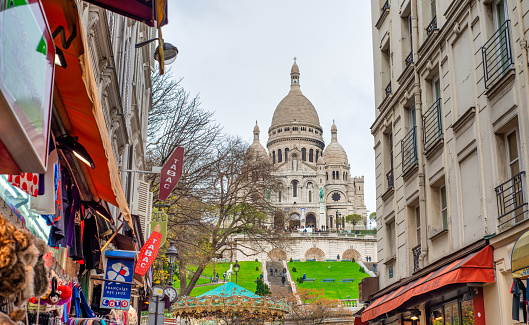 Paris - December 2012: The Sacred Heart Cathedral is a major attraction in Montmartre.