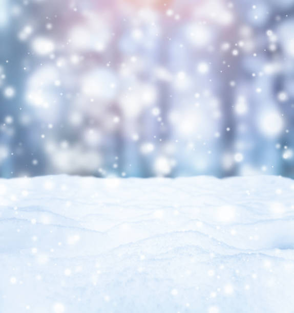 istock Winter background with snow and falling snowflakes 1705539680