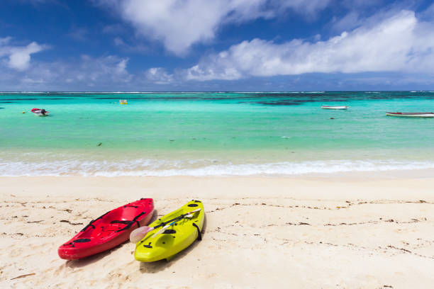 istock Seychelles beach landscape with colorful plastic kayaks 1705557405