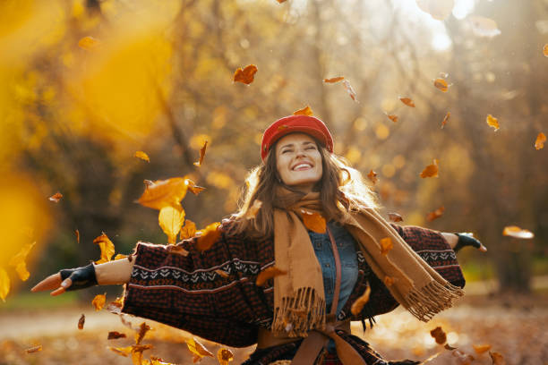 istock happy modern 40 years old woman in red hat rejoicing 1705568044