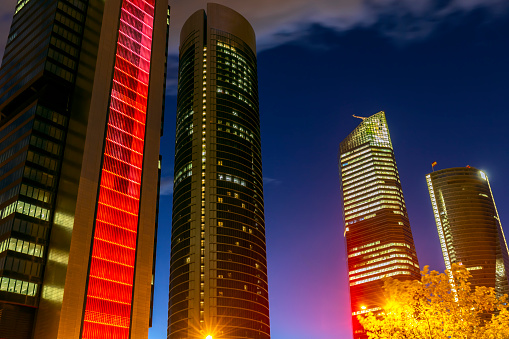 Madrid business district with four Skyscrapers in the night