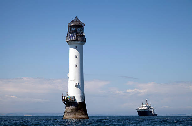 The Bell Rock lighthouse stands on the Inchcape Rock, some 11 miles (18 km) out into the North Sea from the town of Arbroath in Scotland.