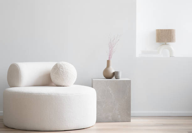 istock Interior design. Modern white sofa in a living room 1705590290