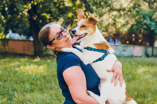 istock Woman enjoy with dog 1705623233