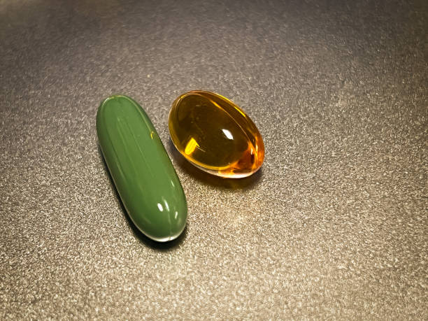 istock Soft capsule of Vitamin on background 1705624305