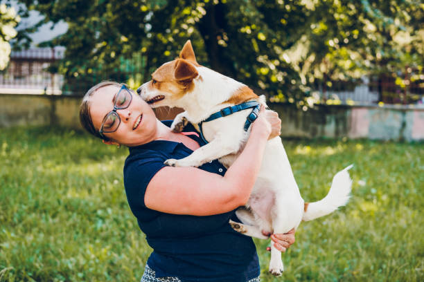 istock Woman enjoy with dog 1705626968