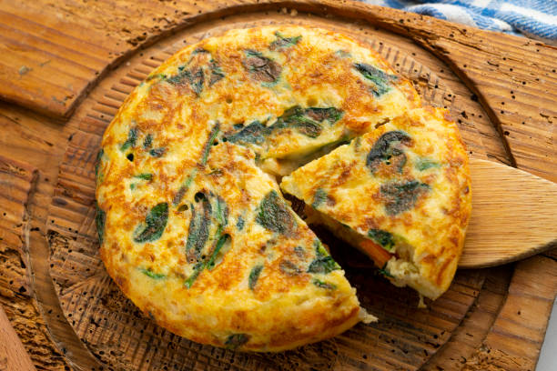 istock Spanish potato omelet with shrimp and spinach. Traditional Spanish tapa. 1705631923
