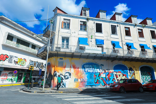 Pointe-a-Pitre, Guadeloupe - October 30, 2022: White Building with Bright and Colorful Painting in the City Center of Pointe-a-Pitre