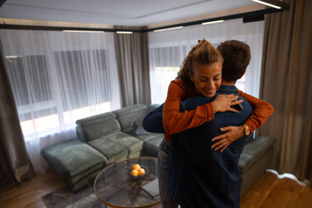 istock Happy couple in new apartment 1705671801
