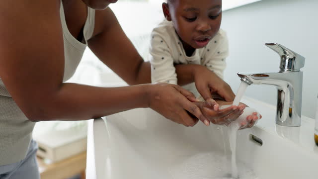Water, help and black man with child washing hands in bathroom, teaching skincare and hygiene for health in home. Cleaning dirt, bacteria and germs with hand wash, dad and girl with natural skin care