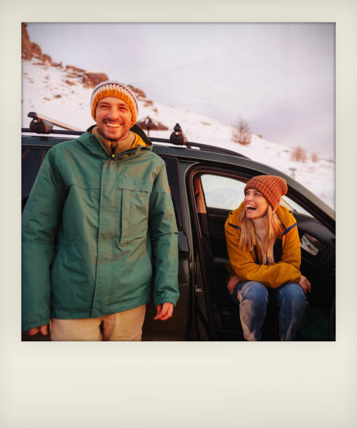 istock Smiling couple enjoy winter road trip 1705686697