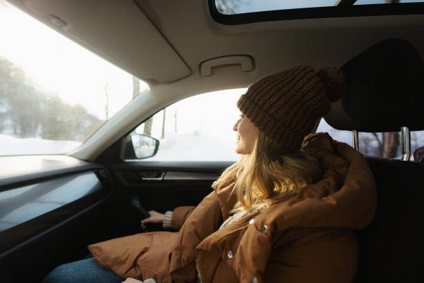 istock Young woman riding in the car 1705686700