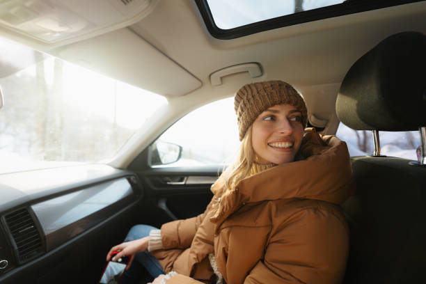istock Young woman riding in the car 1705686719
