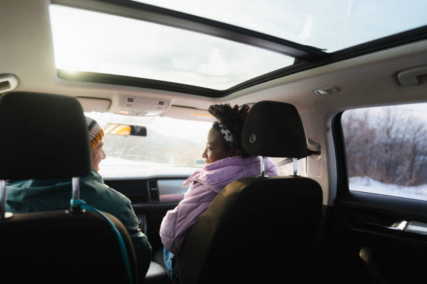 istock Smiling couple enjoy winter road trip 1705686736