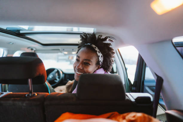 istock Young woman riding in the car 1705687292