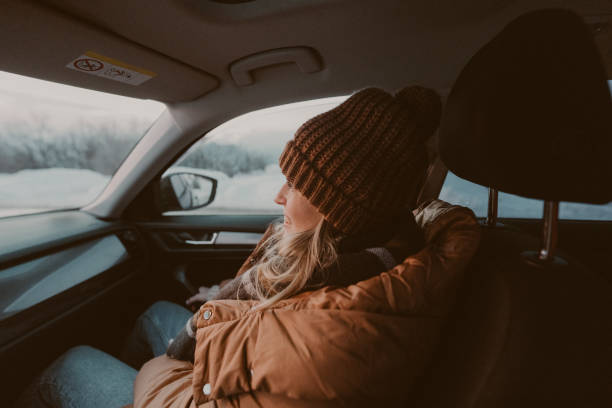 istock Young woman riding in the car 1705696026