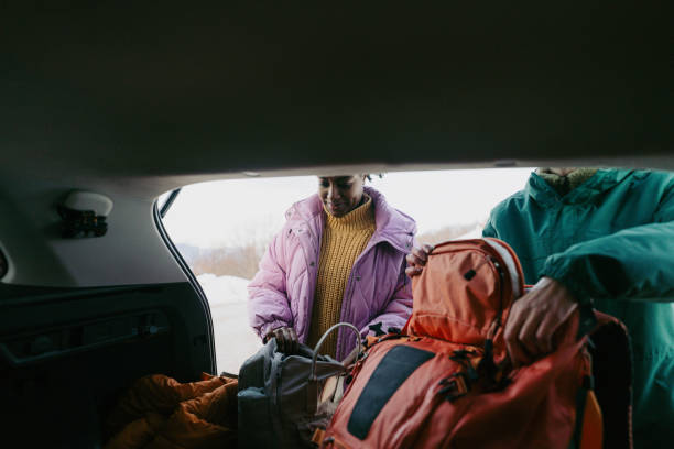 istock Smiling couple preparing for a winter hike 1705696078