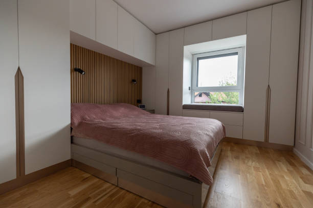 istock Big bed in bedroom 1705699442