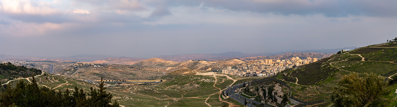 Panoramic view of the Judean hills and desert from the Mount Scopus viewpoint in Jerusalem, Israel.