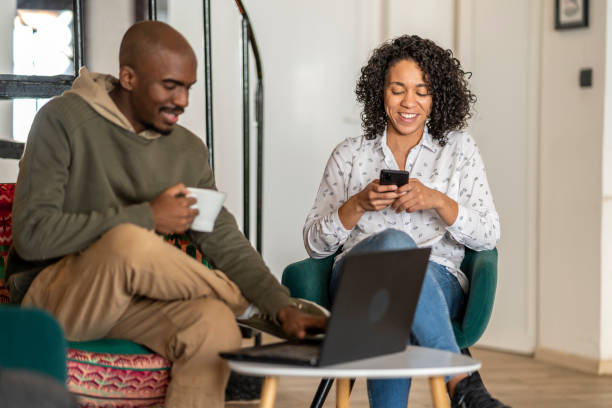 istock African-American couple surfing the web. 1705733052