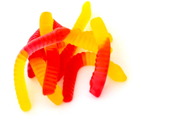 istock Sweet jelly worms on a light background 1705746895