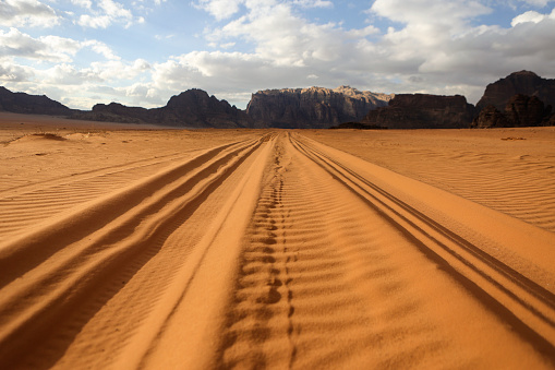 Adventure 4x4 Car among Beautiful Sand Formations in the White Desert Protected Area, is National Park in the Farafra Oasis, Egypt