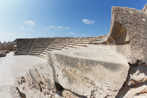 amphitheater steps against blue sky in Paphos Cyprus wide angle fish eye view
