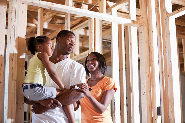 Family in house under construction