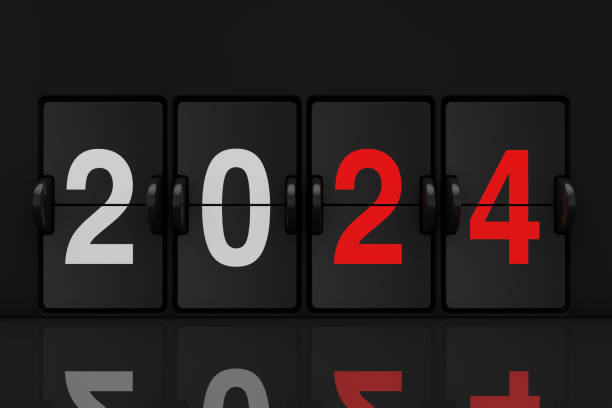 istock Mechanical Analog Flip Clock Board with 2024 New Year Sign. 3d Rendering 1705802834