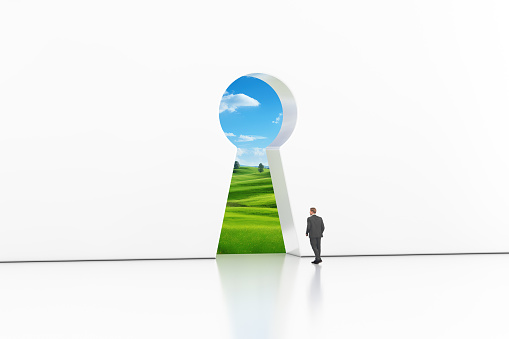 Dreams, Success, Opportunity and Career Concept. Back View of Businessman Walking in Keyhole Window with Green Landscape extreme closeup. 3d Rendering